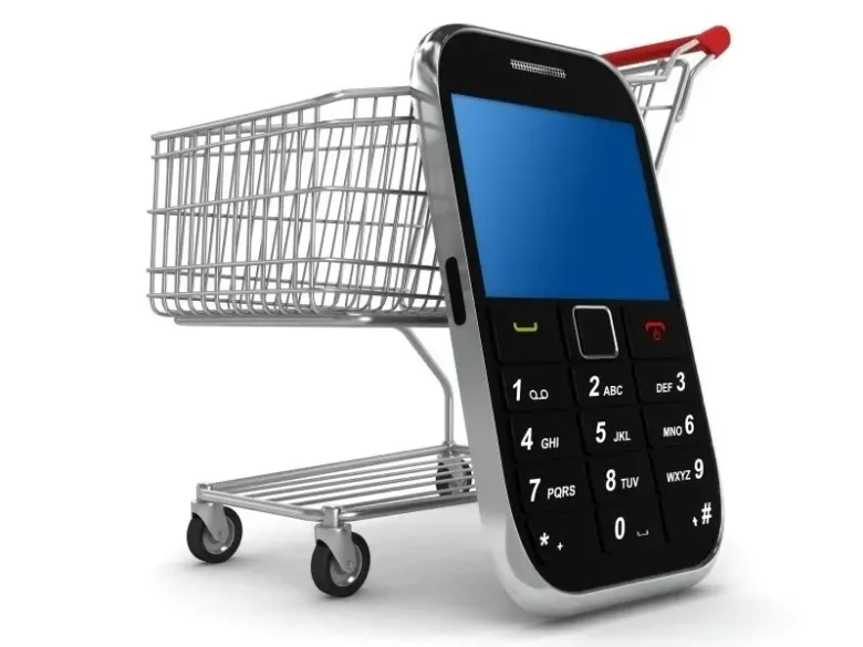 Indkøbsvogn og mobiltelefon